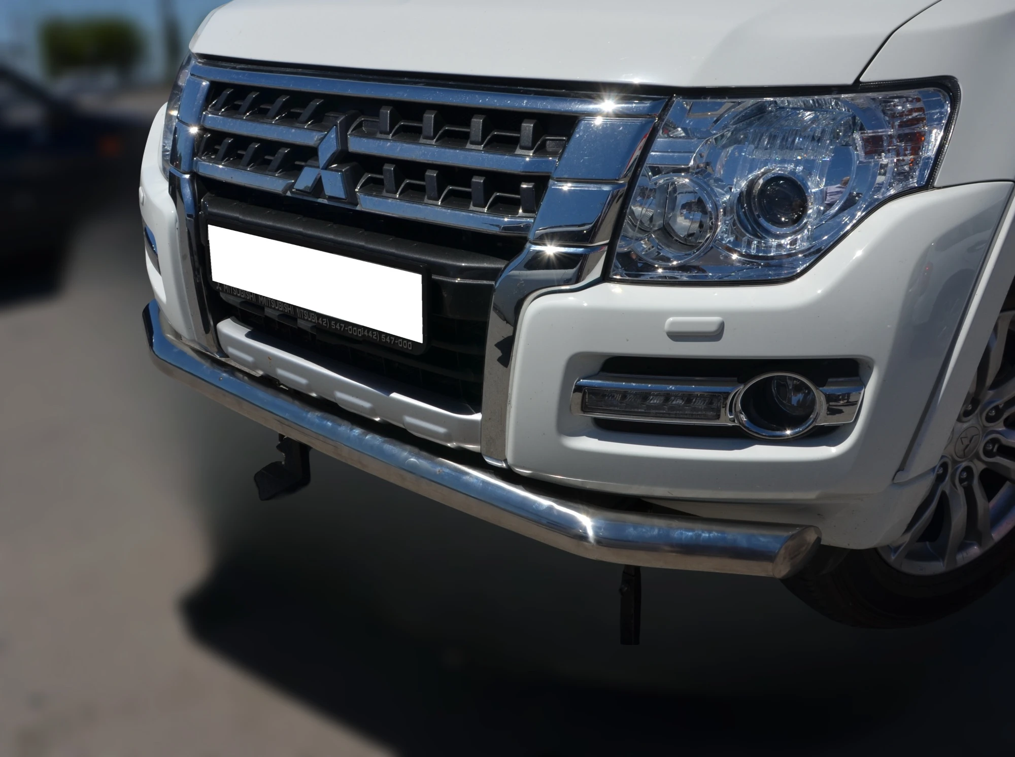 Защита переднего бампера d76 мм для Mitsubishi Pajero IV Рестайлинг 2  Юко MSP4.14-01