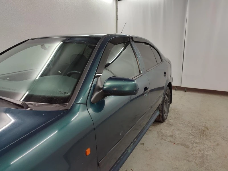 Дефлекторы окон 2D 4 шт для Skoda Octavia I (A4) Черные Стрелка 11 2D063-4.S11