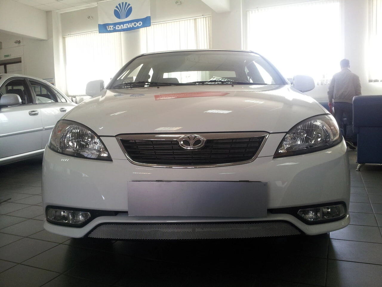 Защитная сетка радиатора низ для Daewoo Gentra II