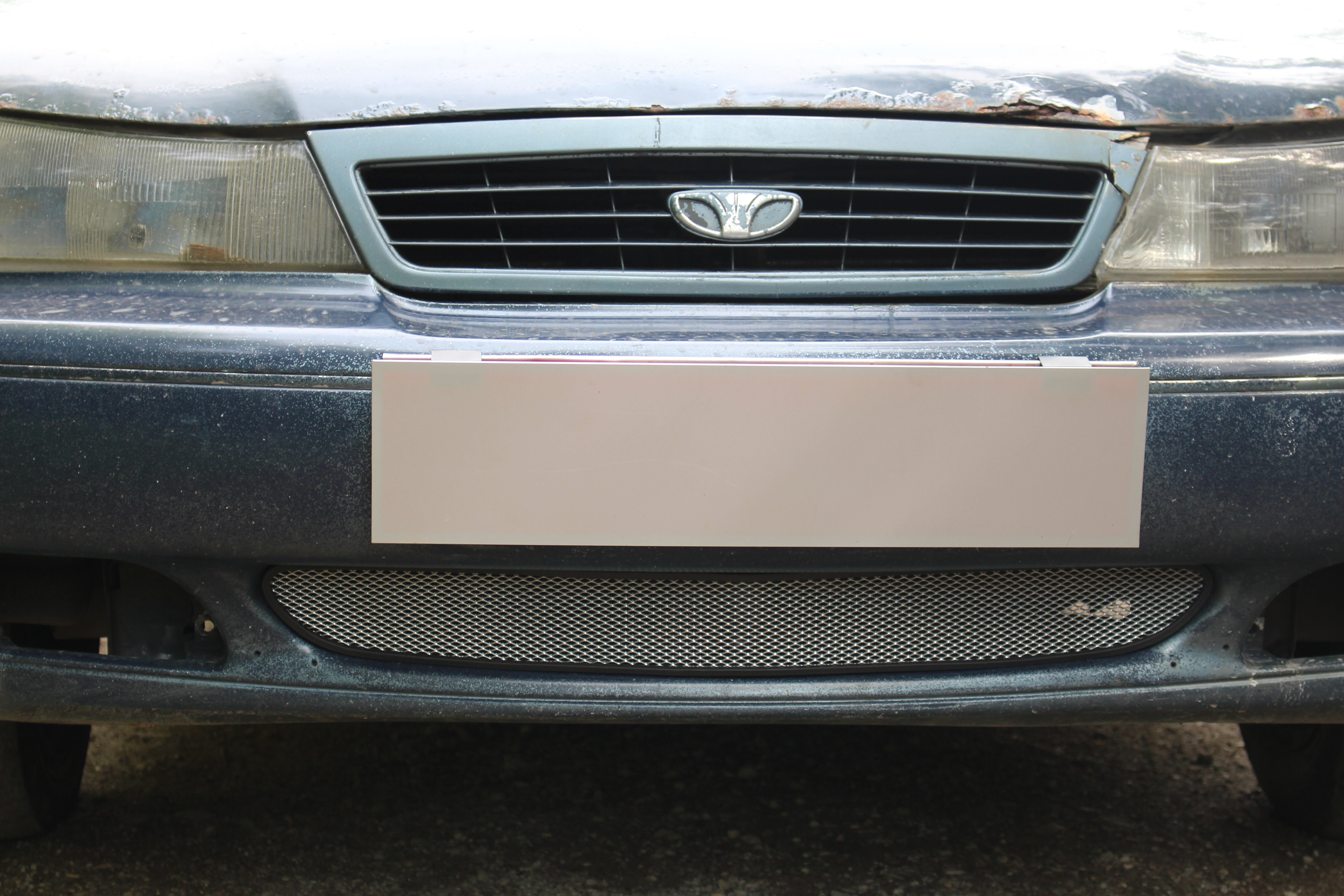 Защитная сетка радиатора низ для Daewoo Nexia I