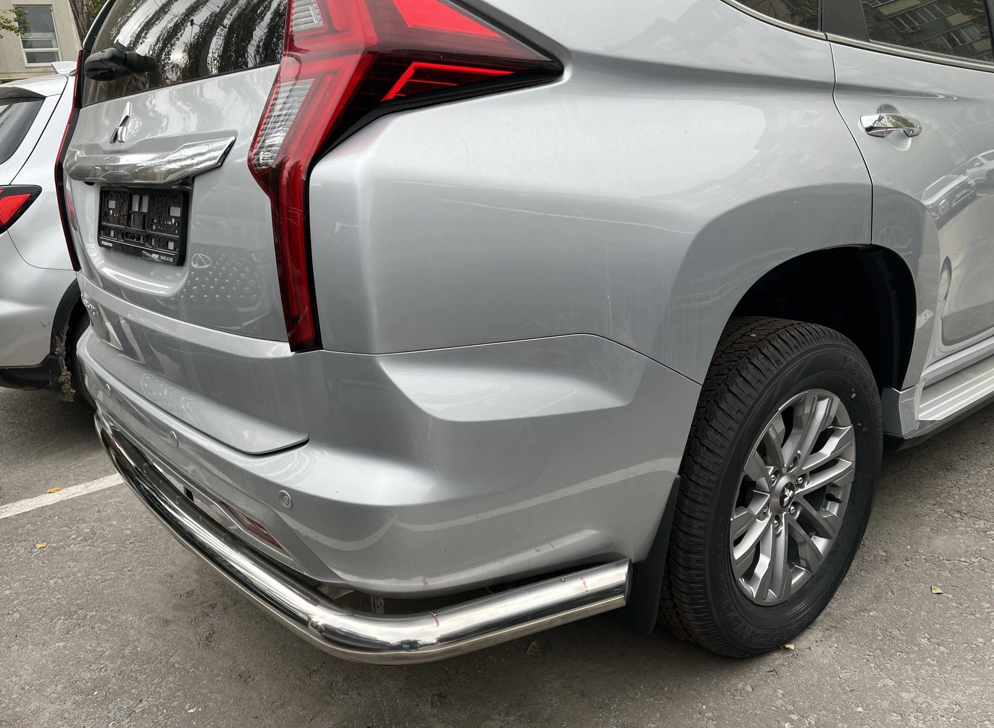 Защита заднего бампера угловая большая d76 мм для Mitsubishi Pajero Sport III Рестайлинг  Юко MSPS.21.21