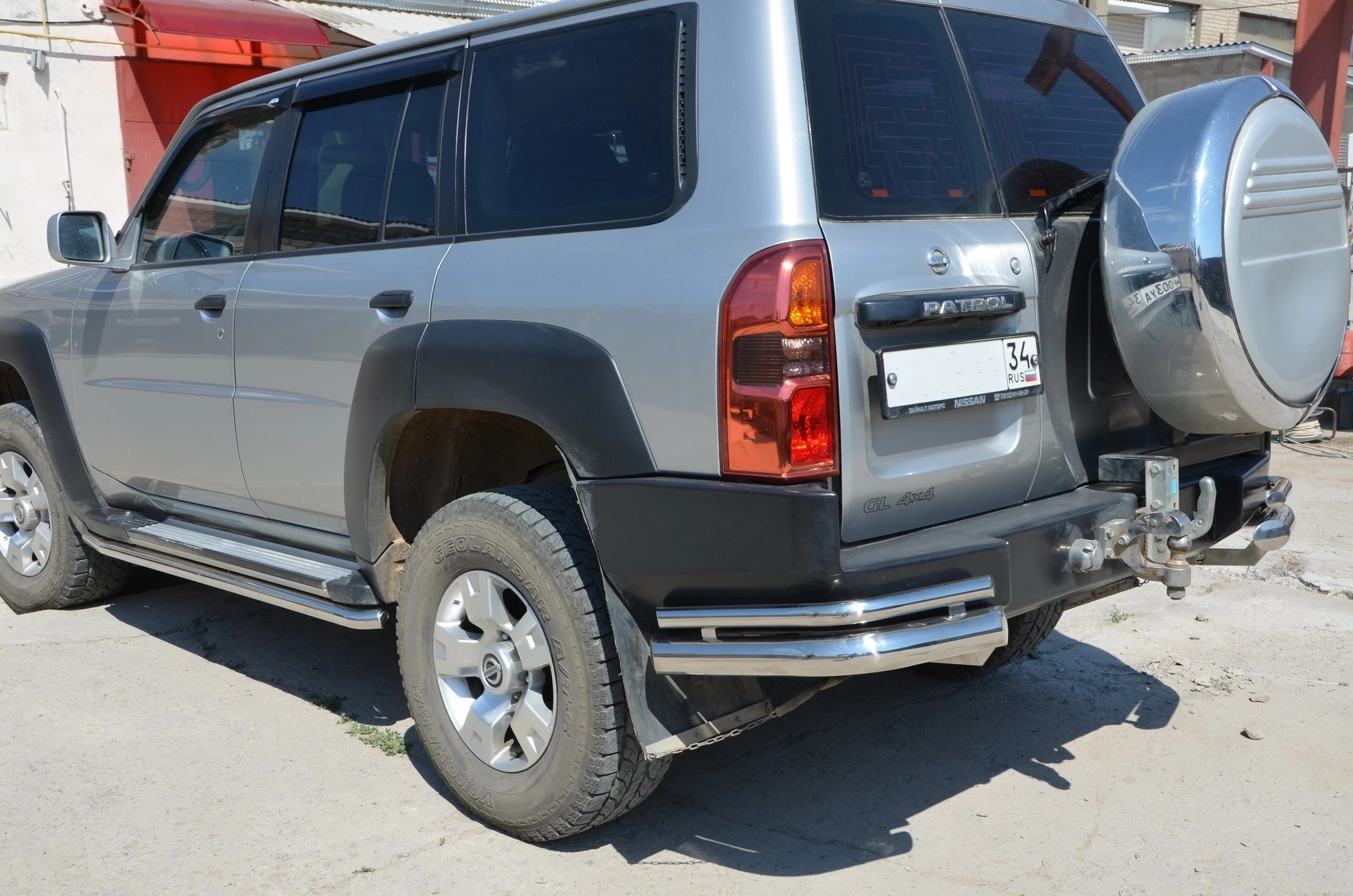 Защита заднего бампера угловая двойная d76/42 мм для Nissan Patrol V (Y61)  Юко NPL.97.20