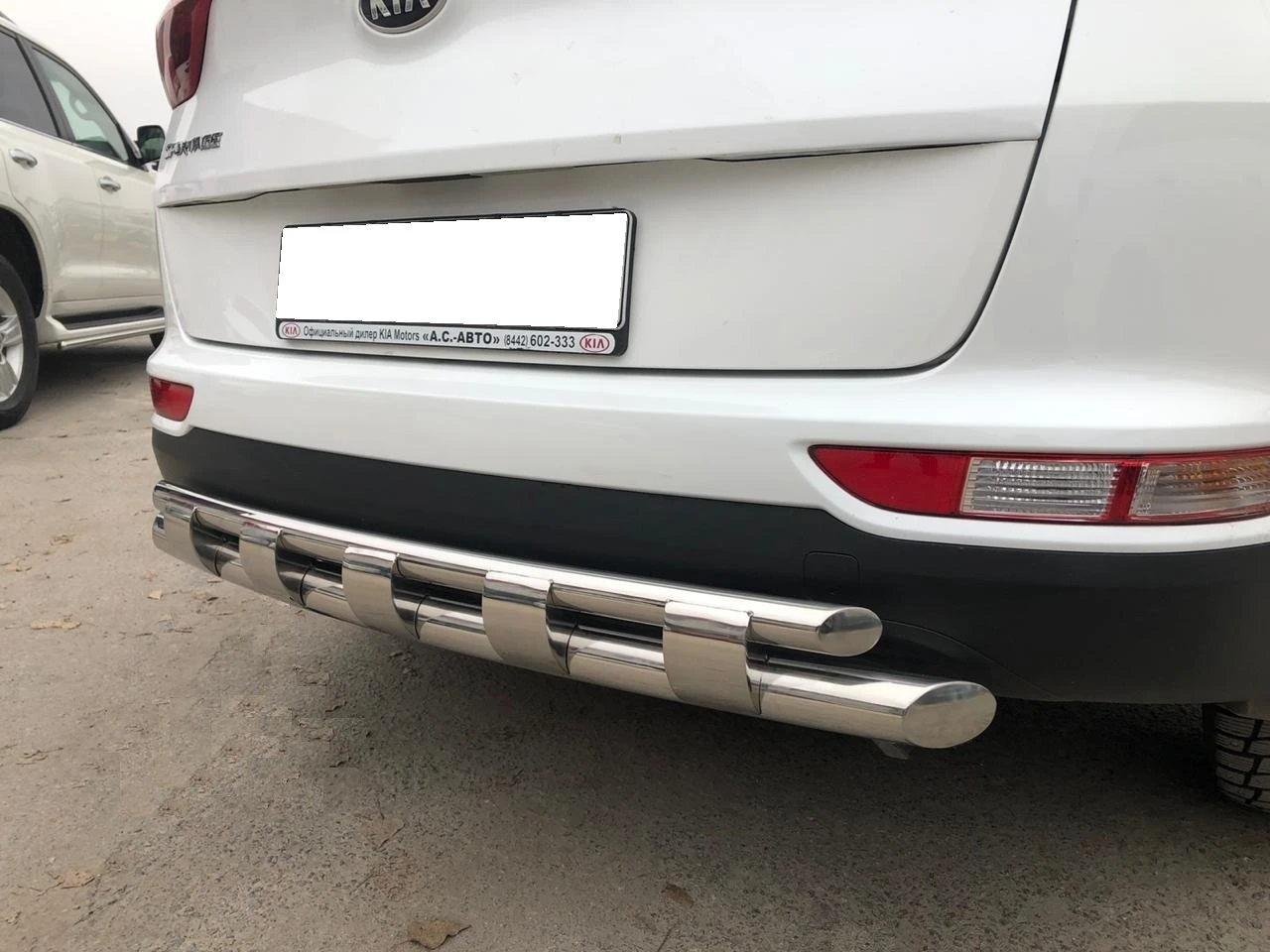 Защита заднего бампера двойная с перемычками d60/42 мм для Kia Sportage III Рестайлинг  Юко KSP.15.25