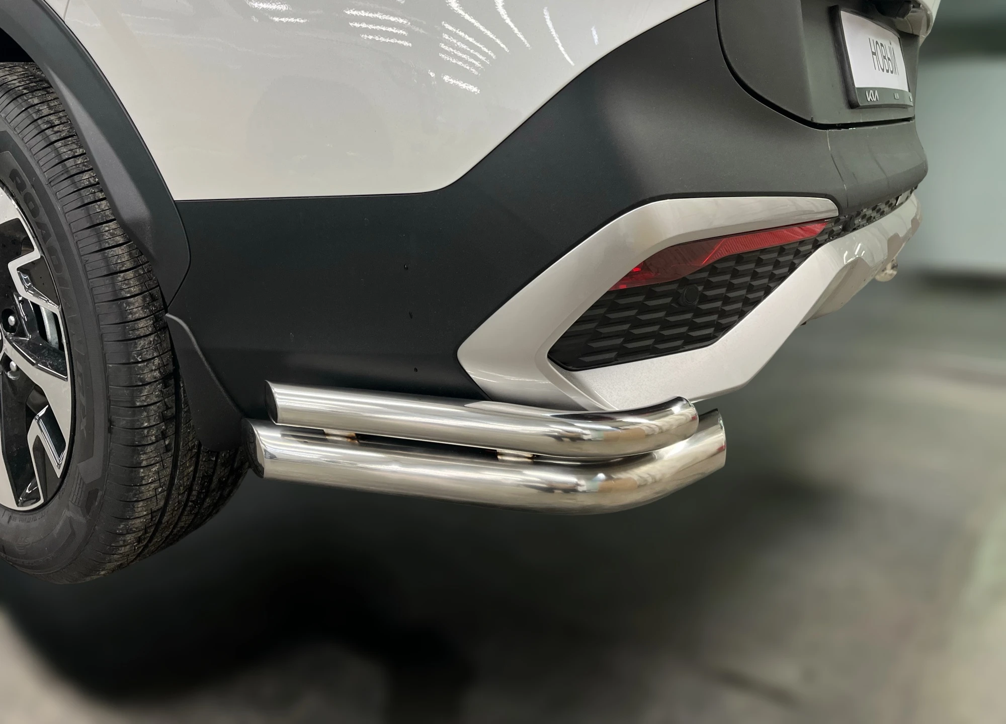 Защита заднего бампера угловая двойная d60/42 мм для Kia Sportage V  Юко KSP.22.19