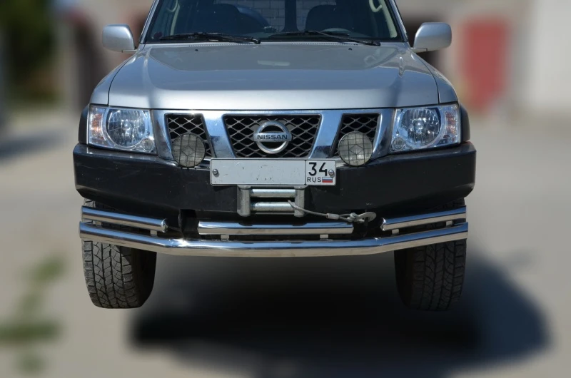 Защита переднего бампера двойная d76/60 мм для Nissan Patrol V (Y61) Рестайлинг  Юко NPL.97.04