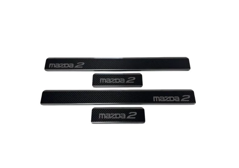 Накладки на пороги нержавеющая сталь под карбон 4шт. для Mazda 2 II (DE) Карбон INOX INOX.MAZ.2.2007.CARBON